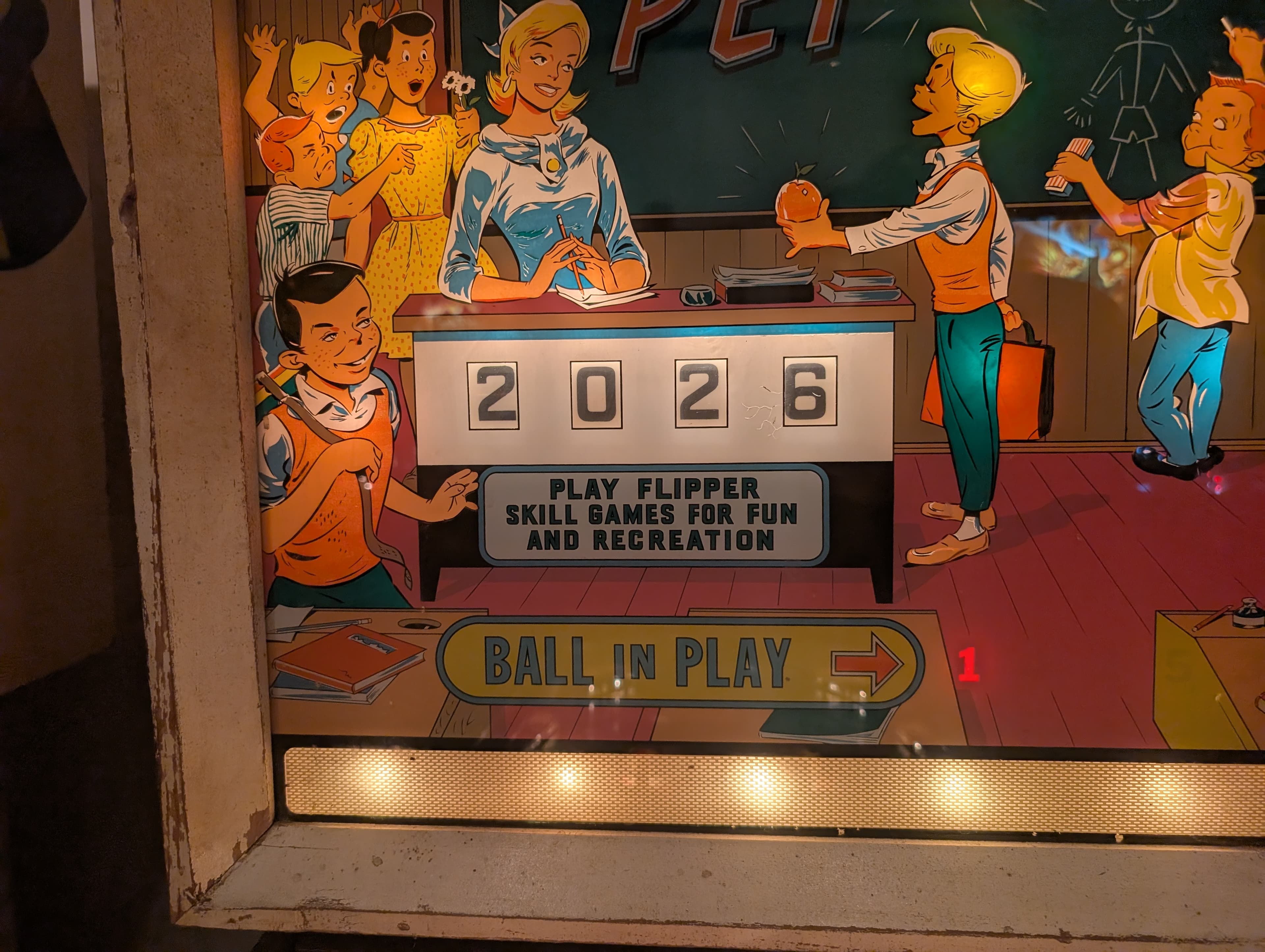 Teacher's Pet pinball backglass showing score reels reading 2026